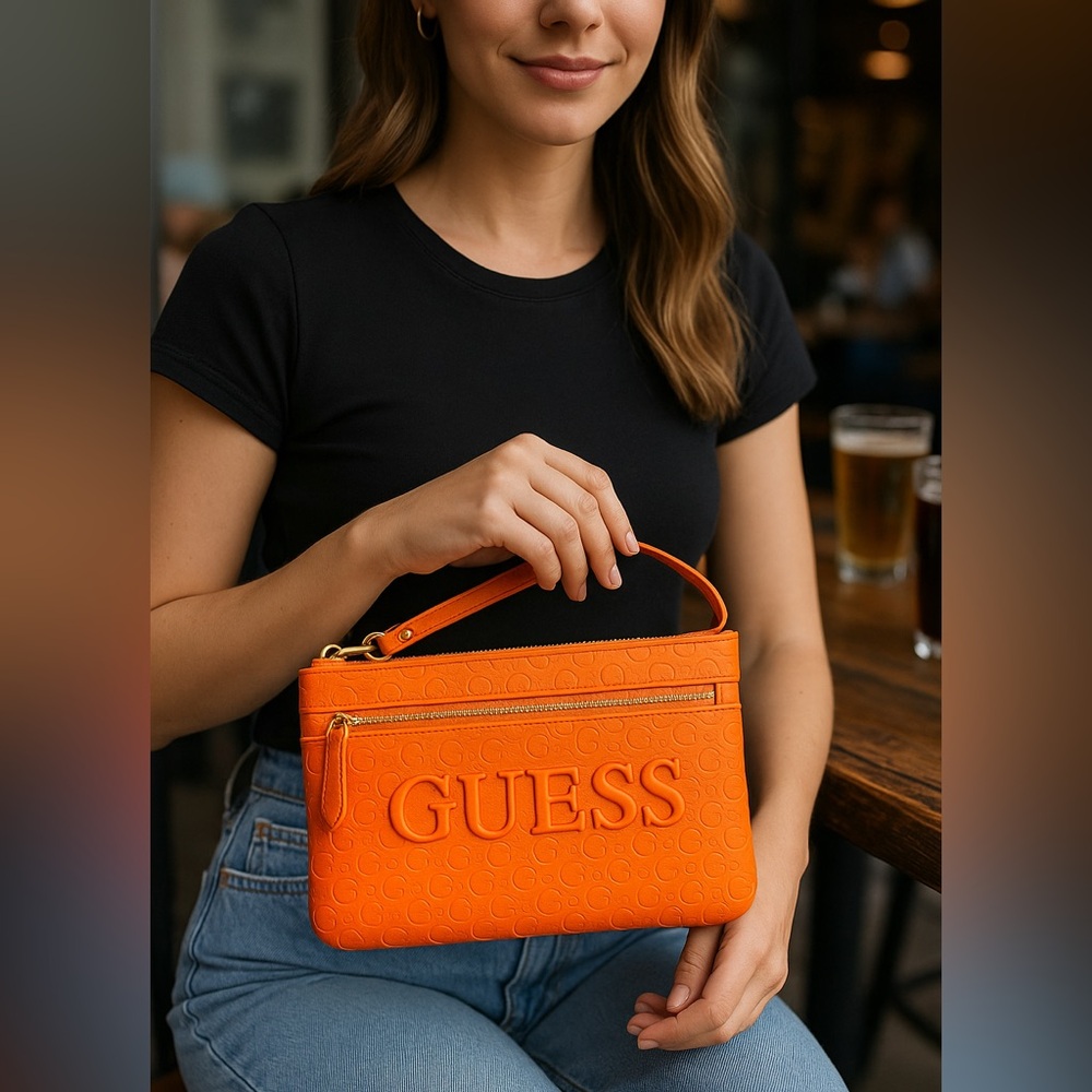 GUESS Women’s Orange Embossed Logo Wristlet Clutch Bag Purse